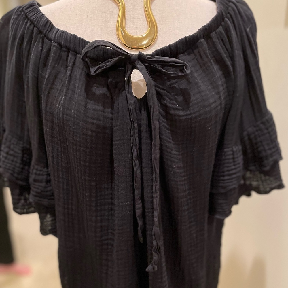 Red Haute top in black “gauze” fabric